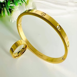 Stainless Hand Cuff & Ring